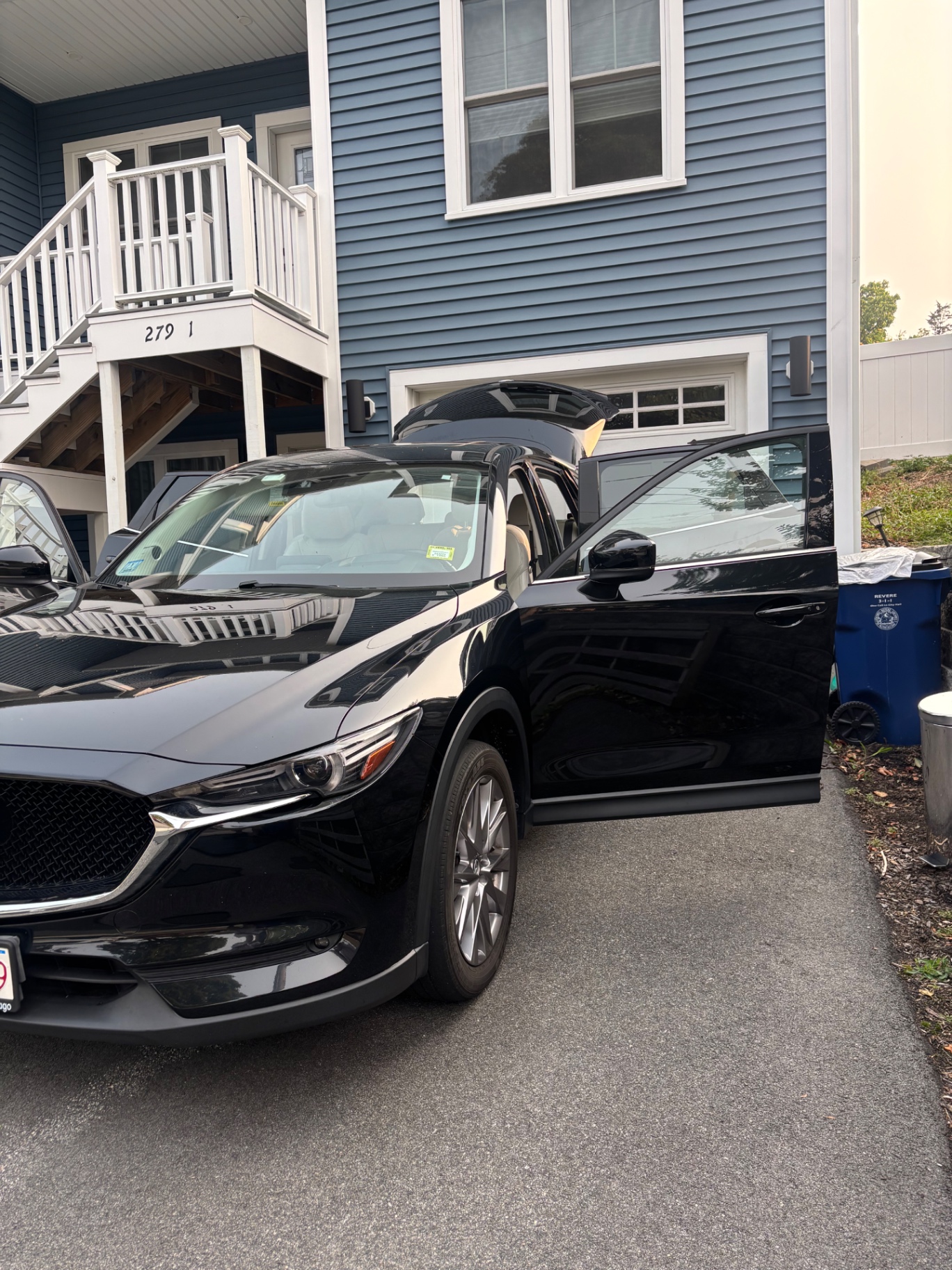 Black Mazda CX-5 with glossy finish